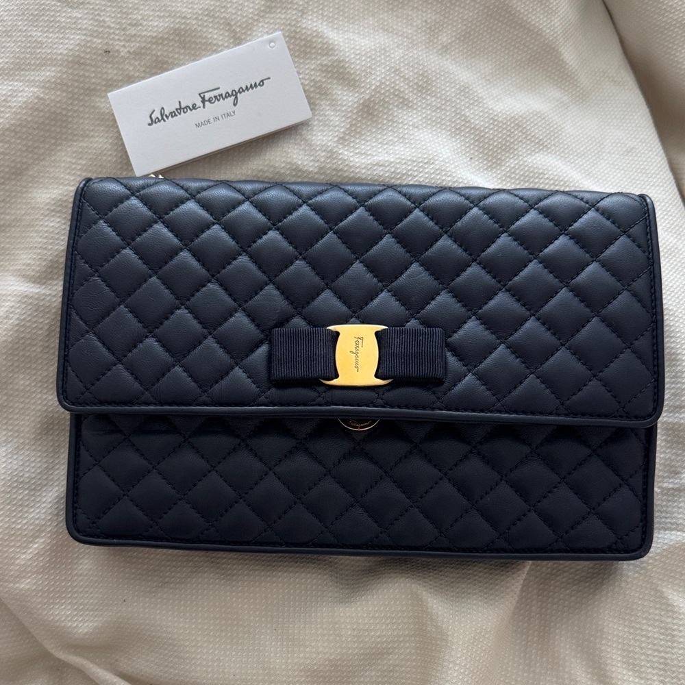 Salvatore Ferragamo Black Quilted Clutch with Gold Bow
